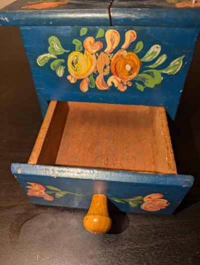 Vintage-style hand painted manual coffee grinder